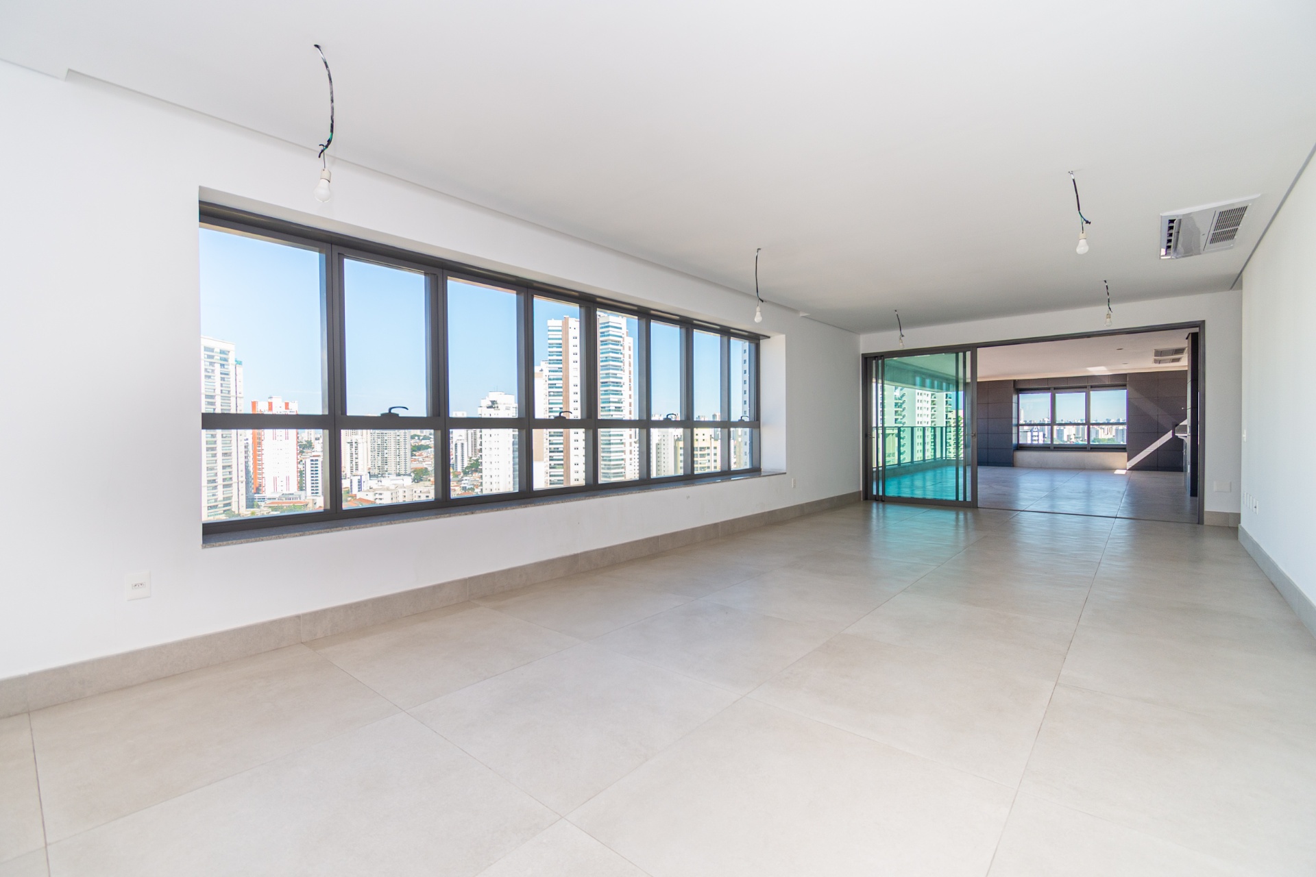 Living amplo com vista panorâmica do Figueira Altos do Tatuapé